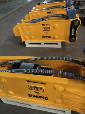 Excavadora JCB3CX con rompehielos, martillo hidráulico